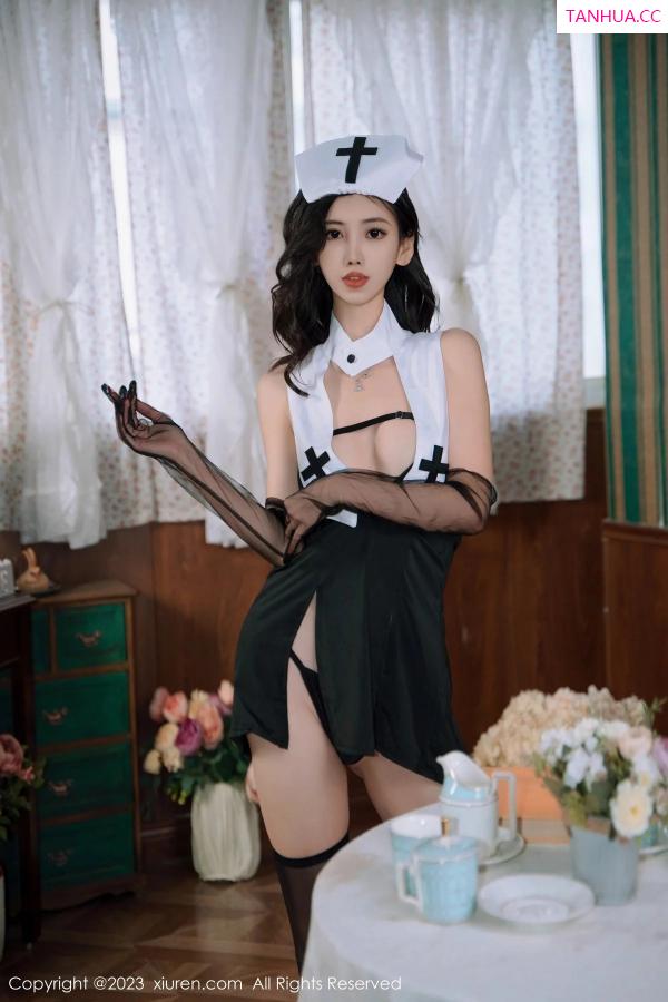   [XiuRen]高清写真图 2023.12.26 No.7868 章芃芃 黑丝美腿第14张图片